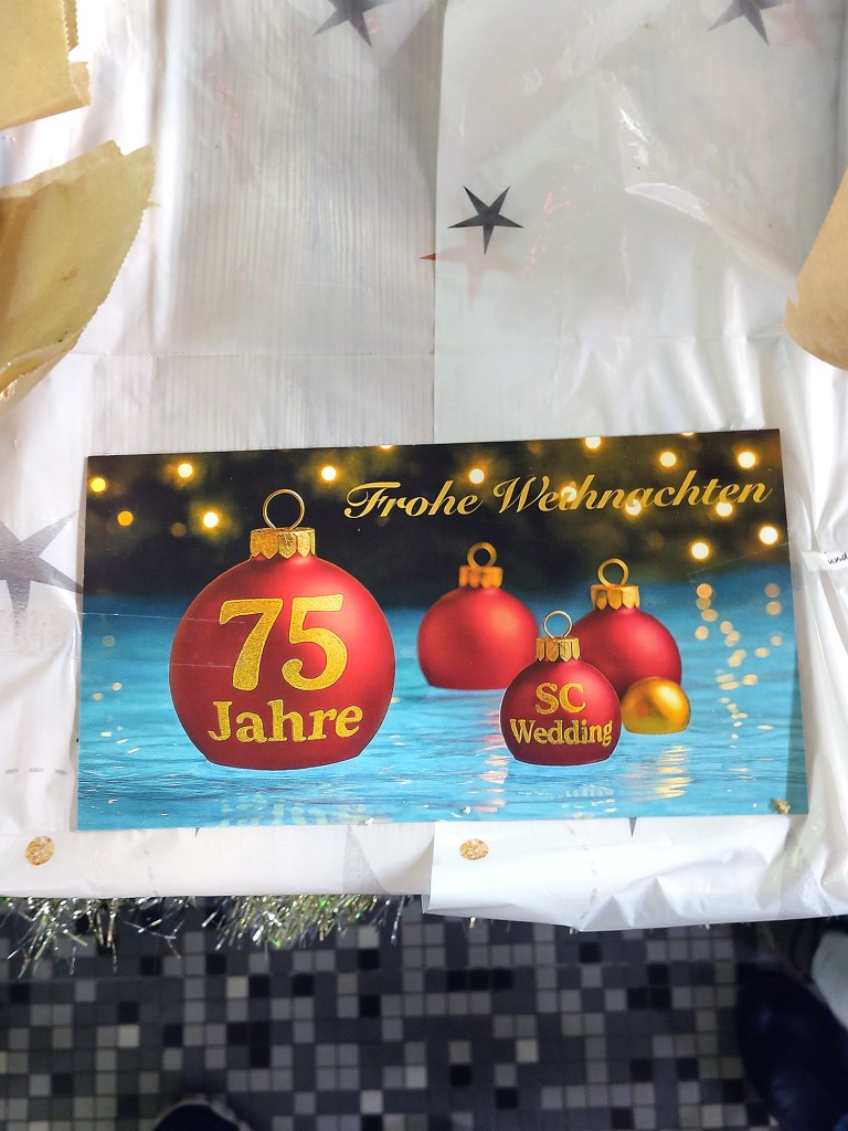 Ein Weihnachtskarte des SC Wedding. Der Verein wurde in diesem Jahr 75 Jahre alt